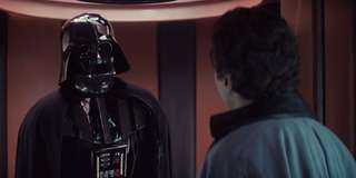 Screenshot from the film Star Wars: The Empire Strikes Back - Darth Vader is talking to Lando Calrissian